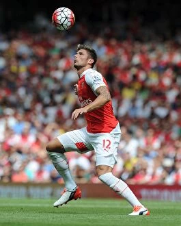 Images Dated 9th August 2015: Arsenal's Olivier Giroud Faces Off Against West Ham United in Intense 2015-16 Premier League Clash