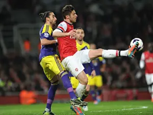Arsenal V Swansea City 2013-14 Prints: Arsenal's Olivier Giroud Fends Off Swansea's Chico Flores in Premier League Clash