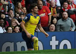 Manchester United V Arsenal 2014-15 Prints: Arsenal's Olivier Giroud Goes Head-to-Head with Manchester United in Premier League Showdown (2014-15)