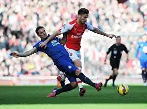 Arsenal Everton 2014-15 Prints: Arsenal's Olivier Giroud Outmaneuvers Everton's Phil Jagielka During the Intense Arsenal vs