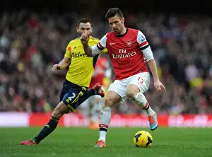 Arsenal's Olivier Giroud Outmaneuvers Sunderland's Phil Bardsley in 2013-14 Premier League Clash