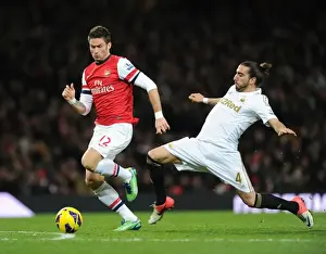 Arsenal V Swansea 2012-13 Prints: Arsenal's Olivier Giroud Outmaneuvers Swansea's Chico Flores in Premier League Clash (December 2012)