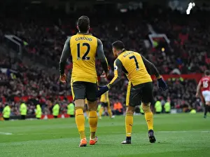 Manchester United V Arsenal 2016-17 Prints: Arsenal's Olivier Giroud Scores and Celebrates with Alexis Sanchez vs Manchester United (2016-17)