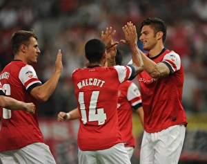 Nagoya Grampus V Arsenal 2013-14 Prints: Arsenal's Olivier Giroud, Theo Walcott