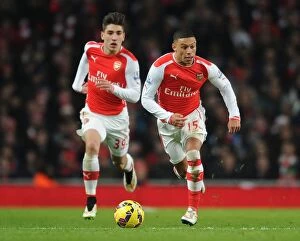 Arsenal v Newcastle United 2014/15 Collection: Arsenal's Oxlade-Chamberlain and Bellerin in Action against Newcastle United (2014/15)