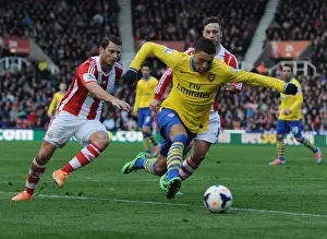 Stoke City V Arsenal 2013-14 Prints: Arsenal's Oxlade-Chamberlain Breezes Past Stoke's Peiters and Arnautovic