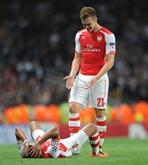 Arsenal V Besiktas 2014/15 Prints: Arsenal's Oxlade-Chamberlain and Chambers