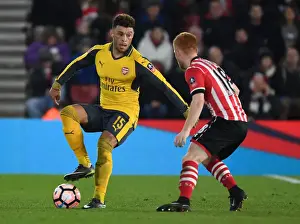 Arsenal's Oxlade-Chamberlain Clashes with Southampton's Reed in FA Cup Showdown