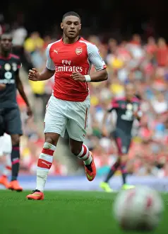 Arsenal V Benfica 2014-15 Prints: Arsenal's Oxlade-Chamberlain Dazzles in Emirates Cup Clash Against Benfica (2014-15)