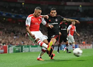 Arsenal's Oxlade-Chamberlain Faces Off Against Besiktas Motta in Champions League Clash
