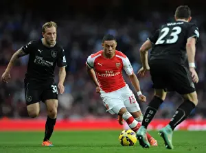 Arsenal's Oxlade-Chamberlain Faces Off Against Burnley's Arfield and Ward