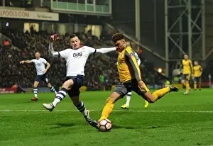 Preston North End V Arsenal - FA Cup - 2017 Prints: Arsenal's Oxlade-Chamberlain Faces Off Against Preston's Vermijl in FA Cup Clash