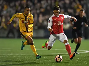 Arsenal's Oxlade-Chamberlain Faces Off Against Sutton's Eastmond: The FA Cup Shock Encounter