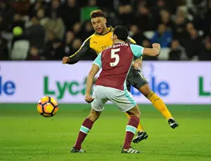 Olympic Stadium Prints: Arsenal's Oxlade-Chamberlain Faces Off Against West Ham's Arbeloa in Premier League Clash