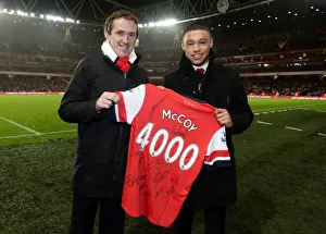 Arsenal V Chelsea 2013-14 Prints: Arsenal's Oxlade-Chamberlain Honors Jockey AP McCoy with Signed Shirt at Half-Time (Arsenal v Chelsea)
