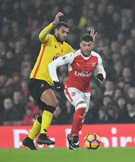 Arsenal V Watford 2016-17 Prints: Arsenal's Oxlade-Chamberlain Outmaneuvers Watford's Capoue in Premier League Clash