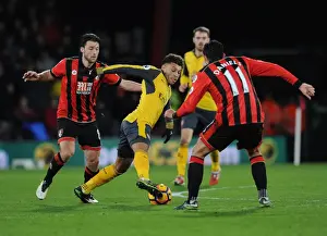 AFC Bournemouth V Arsenal 2016-17 Prints: Arsenal's Oxlade-Chamberlain Stands Firm Against Bournemouth Duo Arter and Daniels in Intense Premier League Battle