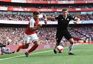 Arsenal V Seville - Emirates Cup 2017-18 Prints: Arsenal's Oxlade-Chamberlain vs. Sevilla's Corchia: Emirates Cup Showdown