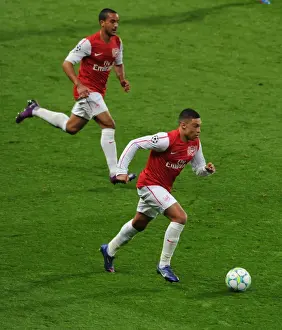 Arsenal V AC Milan 2011-12 Prints: Arsenal's Oxlade-Chamberlain and Walcott in Action against AC Milan