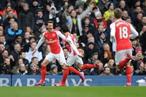 Images Dated 7th February 2015: Arsenal's Ozil and Cazorla: Celebrating Glory Over Spurs in the 2015 Premier League