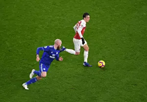 Arsenal V Cardiff City 2018-19 Prints: Arsenal's Ozil Clashes with Cardiff's Gunnarsson in Premier League Showdown