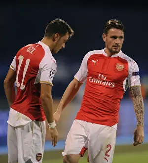 Dinamo Zagreb V Arsenal 2015-16 Prints: Arsenal's Ozil and Debuchy: A Moment from the Dinamo Zagreb Showdown (2015-16)