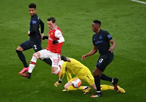 Arsenal V Everton 2019-20 Prints: Arsenal's Ozil Faces Intense Pressure from Everton's Holgate, Mina, and Pickford