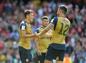 Arsenal v Olympique Lyonnais - Emirates Cup 2015/16 Collection: Arsenal's Ozil and Giroud: Celebrating Goals in Emirates Cup 2015/16