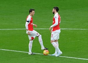 Arsenal v Newcastle United 2015-16 Collection: Arsenal's Ozil and Giroud Gear Up for Kick-off Against Newcastle United (2015-16)
