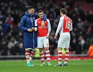 Arsenal's Ozil, Giroud, and Monreal: United in Action against Stoke City (2014-15)