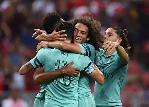 Arsenal V PSG Pre Season Friendly 2018-19 Prints: Arsenal's Ozil and Guendouzi
