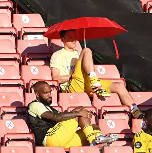 Arsenal's Ozil and Lacazette Seek Shade in Southampton's Summer Showdown (2019-20)
