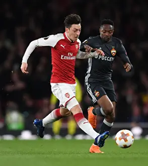 Arsenal V CSKA Moscow 2017-18 Prints: Arsenal's Ozil and Musa Clash in Europa League Quarterfinal