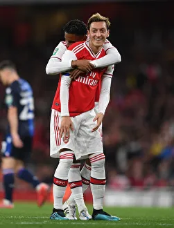 Arsenal V Nottingham Forest Carabao Cup 3rd Rd 2019-20 Prints: Arsenal's Ozil and Nelson in Action: Battling Nottingham Forest in Carabao Cup Clash