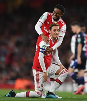 Arsenal V Nottingham Forest Carabao Cup 3rd Rd 2019-20 Prints: Arsenal's Ozil and Nelson in Action: Clash Against Nottingham Forest in Carabao Cup
