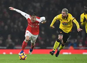 Arsenal V Watford 2016-17 Prints: Arsenal's Ozil Outmaneuvers Watford's Behrami in Premier League Clash