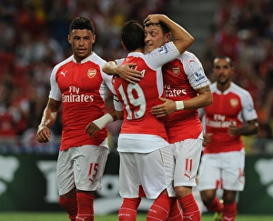 Arsenal's Ozil, Oxlade-Chamberlain, and Cazorla Celebrate Goals Against Everton in 2015-16 Asia Trophy