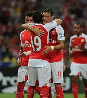 Images Dated 18th July 2015: Arsenal's Ozil Scores Hat-Trick: Arsenal Triumphs Over Everton in Barclays Asia Trophy