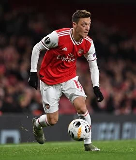 Images Dated 29th November 2019: Arsenal's Ozil Shines in Europa League Clash Against Eintracht Frankfurt