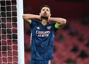 Arsenal's Pablo Mari in Emirates Stadium: A Lone Warrior in the UEFA Europa League Amidst Empty Seats