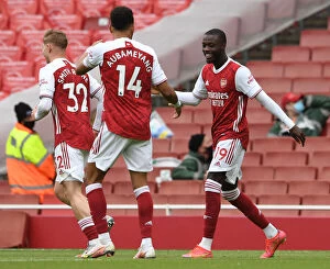 Arsenal v Brighton & Hove Albion 2020-21 Collection: Arsenal's Pepe and Aubameyang Celebrate Goals Against Brighton in 2020-21 Premier League