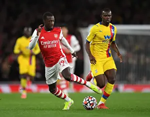 Arsenal V Crystal Palace 2021-22 Prints: Arsenal's Pepe Clashes with Palace's Mitchell in Premier League Showdown