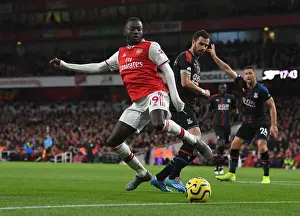 Arsenal V Crystal Palace 2019-20 Prints: Arsenal's Pepe Faces Off Against Palace's Milivojevic in Premier League Clash
