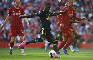 Arsenal's Pepe Goes Head-to-Head with Liverpool: Premier League Showdown, 2019-20