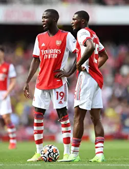 Arsenal V Norwich City 2021-22 Prints: Arsenal's Pepe and Maitland-Niles in Action against Norwich City (2021-22)