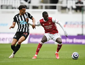 Newcastle United V Arsenal 2020-21 Prints: Arsenal's Pepe vs Murphy: A Battle at Empty St