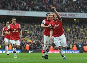 Images Dated 13th April 2013: Arsenal's Podolski and Cazorla Celebrate Goals Against Norwich City (2012-13)