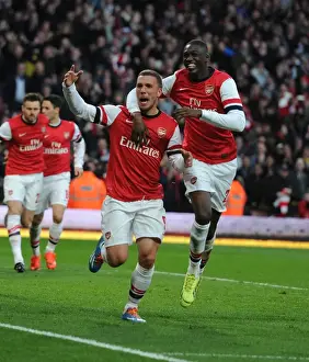 Arsenal V Liverpool - FA Cup 2013-14 Prints: Arsenal's Podolski and Sanogo Celebrate Goals Against Liverpool in FA Cup Fifth Round