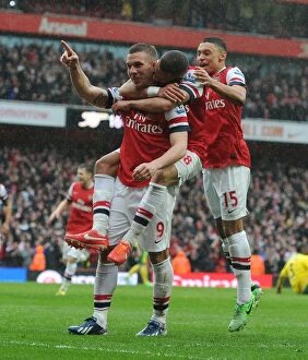 Images Dated 13th April 2013: Arsenal's Podolski Scores Third Goal Against Norwich City, April 2013