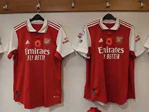 Chelsea V Arsenal 2022-23 Prints: Arsenal's Poppy-Adorned Jerseys: A Tradition of Honor in the Chelsea Showdown